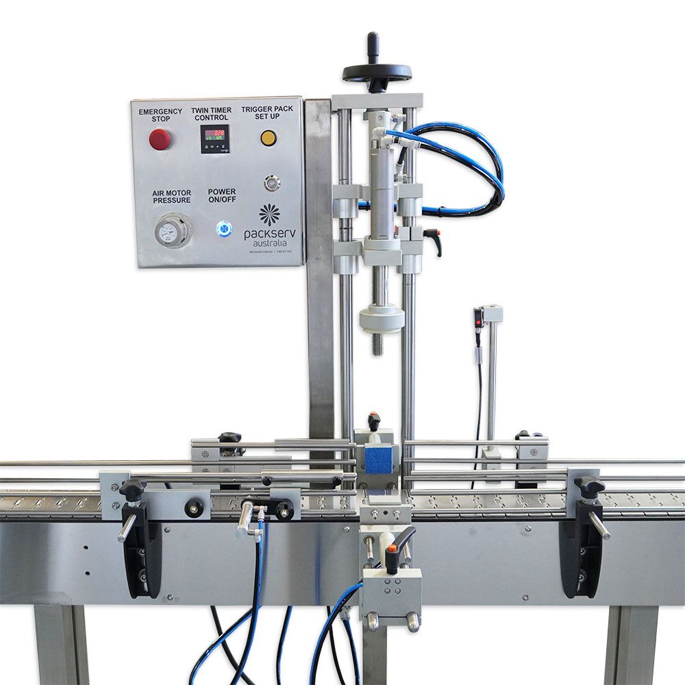 Side view of Packserv PCM-1A-E automatic capper with electronic timer on stainless steel frame