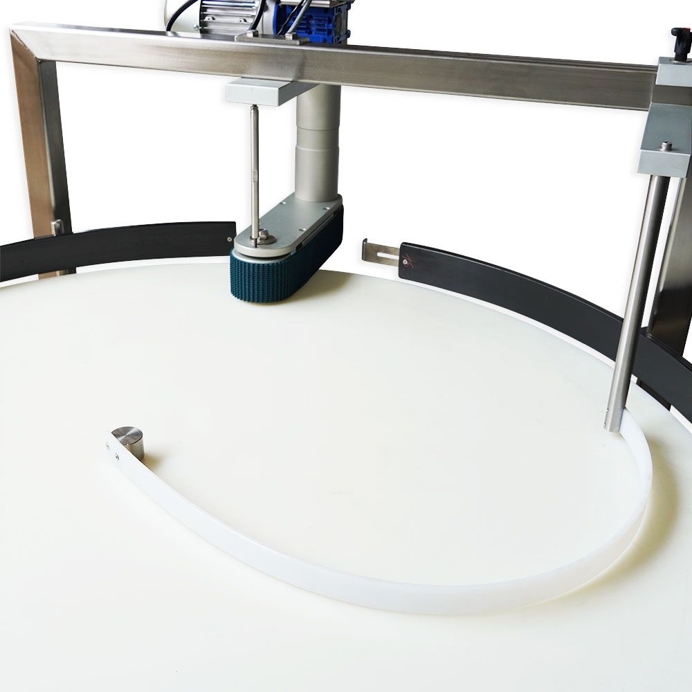 Detailed view of the Packserv PST-8 Sorting Table's adjustable guide rails, designed for precise sorting in manufacturing processes.