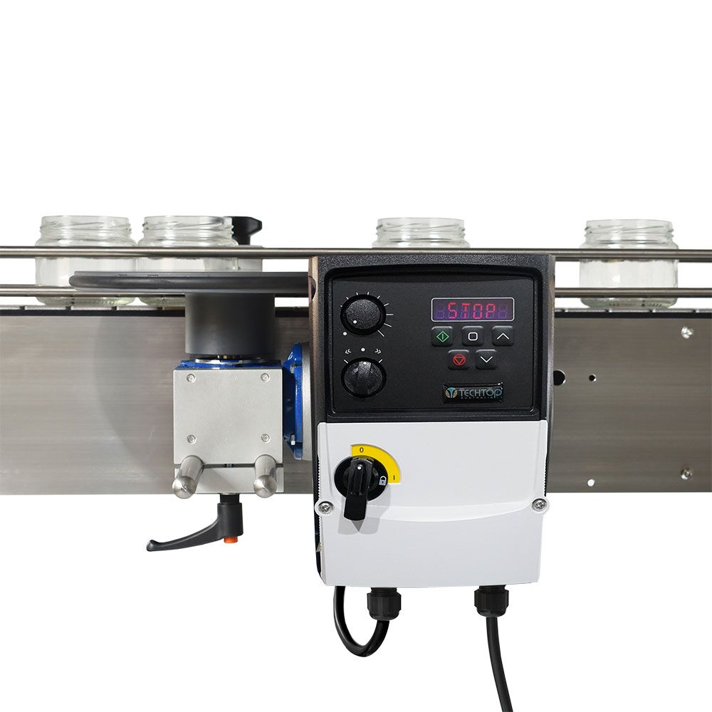 Close-up of Packserv PSW-10 Spacing Wheel with bottle containers in motion