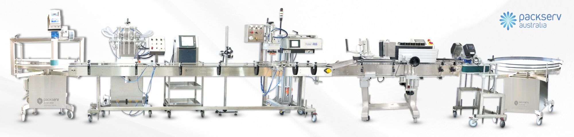 Four-Head Automatic Filler Machine Line by Packserv, ideal for high-volume filling in manufacturing environments.